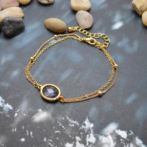 C-080 Tanzanite bracelet, Gold fram..