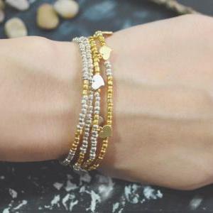 C-127 Gold, Silver Beaded bracelet,..